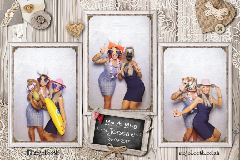 Picture taken by photo booth mirror encapsulated in a rustic lace and burlap template. The wedding guests are wearing props and posing.